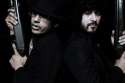 The_Mars_Volta_with_guns.jpg
