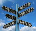 13564622-Puzzled-Confused-Lost-Signpost-Shows-Puzzling-Problem-Stock-Photo.jpg