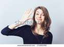 stock-photo-girl-showing-hello-274980368.jpg