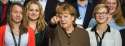 Merkel with german girls.jpg