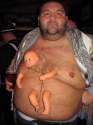 5fb5c6dafe6c02eaf21dab6ea098fdfa-fat-guy-has-baby-doll-growing-out-of-him.jpg