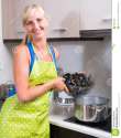 woman-cooking-mussels-home-smiling-blonde-girl-steaming-boiled-water-68860483.jpg