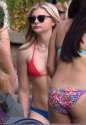 Chloe_wore_a_red_bikini_top_and_blue_bottoms.jpg