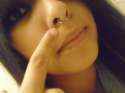 girl-showing-her-nasal-septum-piercing.jpg