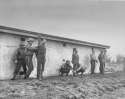 US troops tying up German POWs for execution by firing squad.jpg