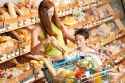 4932008-Woman-and-child-buying-bread-in-a-supermarket-Stock-Photo-supermarket.jpg