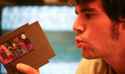 blowing-into-nintendo-cartridge.jpg