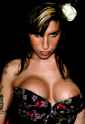 amy-winehouse-big-cleavage-and-oops-nipple-slip-x92.jpg