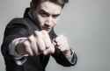 businessman-throwing-a-punch-business-660x430.jpg