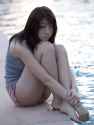Asian_Waiting_Next_to_the_Water.jpg