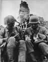 German soldier with kittens.png