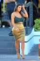 Kim Kardashian In Golden Skirt at Prestige Imports car showroom in Miami-12-640x960.jpg