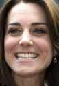 321918F500000578-3487810-Kate_beamed_widely_showing_off_her_perfectly_white_teeth_She_acc-m-227_1457711992052.jpg
