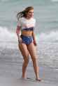 bella-thorne-in-bikini-on-the-set-of-a-photoshoot-at-a-beach-in-malibu-03-03-2016_2.jpg
