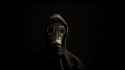 stock-footage-smoke-rising-behind-a-man-in-a-gas-mask.jpg