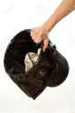 18904254-Hand-holding-trash-bin-with-paper-in-it-Stock-Photo-bag.jpg