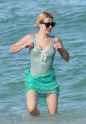 emma-roberts-in-a-swimsuit-on-the-beach-in-miami-july-2016-15.jpg