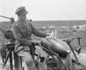 12inchRailwayHowitzerShell444SiegeBatteryAndKitten19July1918.jpg