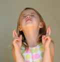 little-girl-finger-crossed.jpg