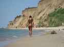 Brunette nude beach ass 01.jpg