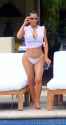 kim-kardashian-in-bikini-bottom-at-a-pool-in-mexico-04-25-2017-_1.jpg