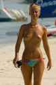 Topless_woman_Coral_Beach,_Jamaica_2.jpg