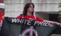 Immigration Protest - Girl with White Pride Banner, Knoxville, August 14, 2010.jpg