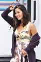 olivia-munn-shows-some-cleavage-in-a-low-cut-floral-print-dress-while-on-the-set-of-buddy-games-filming-in-vancouver-canada_4.jpg
