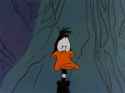 daffy duck licking lips.gif