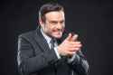 scheming-man-rubbing-his-hands-smiling-anticipation-84045597.jpg