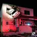 car in wall.jpg