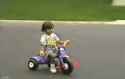 Accindet - Girl Riding Big Wheel Hirs Curb & Smashes Face on Grass (Violent).gif
