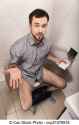 close-up-of-man-in-toilet-holding-picture_csp21478918.jpg